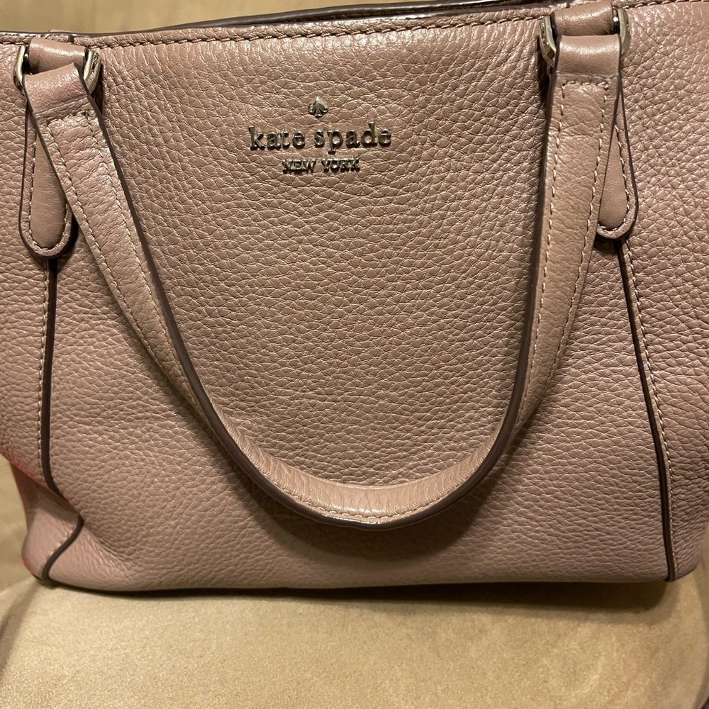 Kate spade purse with detachable cross body strap! Only used a few times